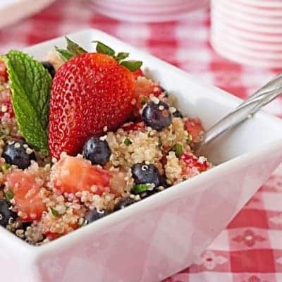 Quinoa with fruit in white dish - Memorial Day side dishes