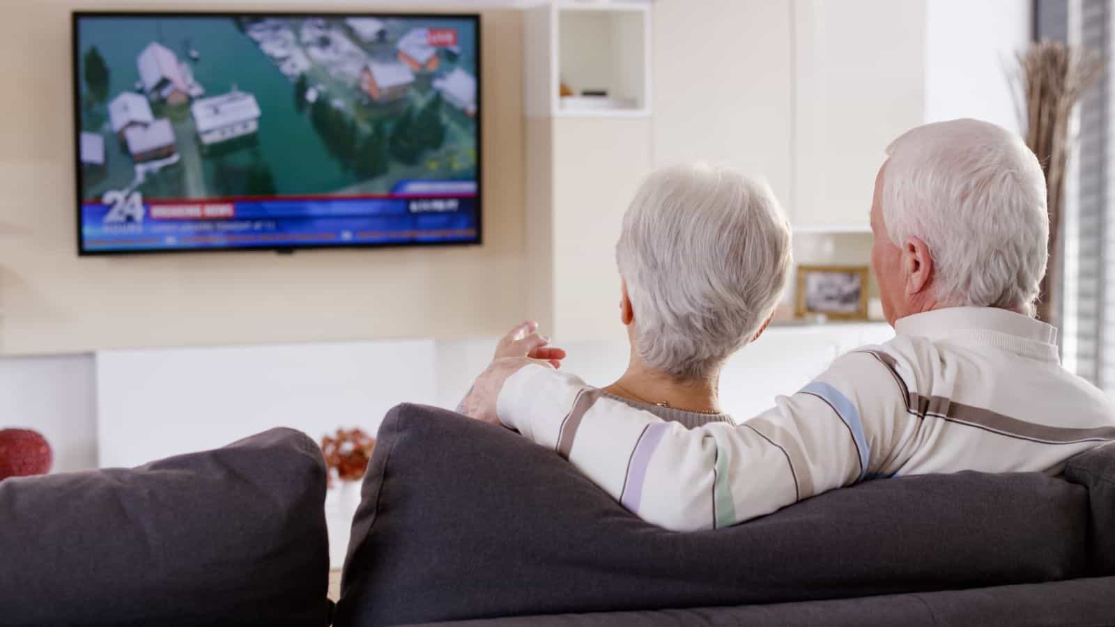 Elderly Couple Watching News 