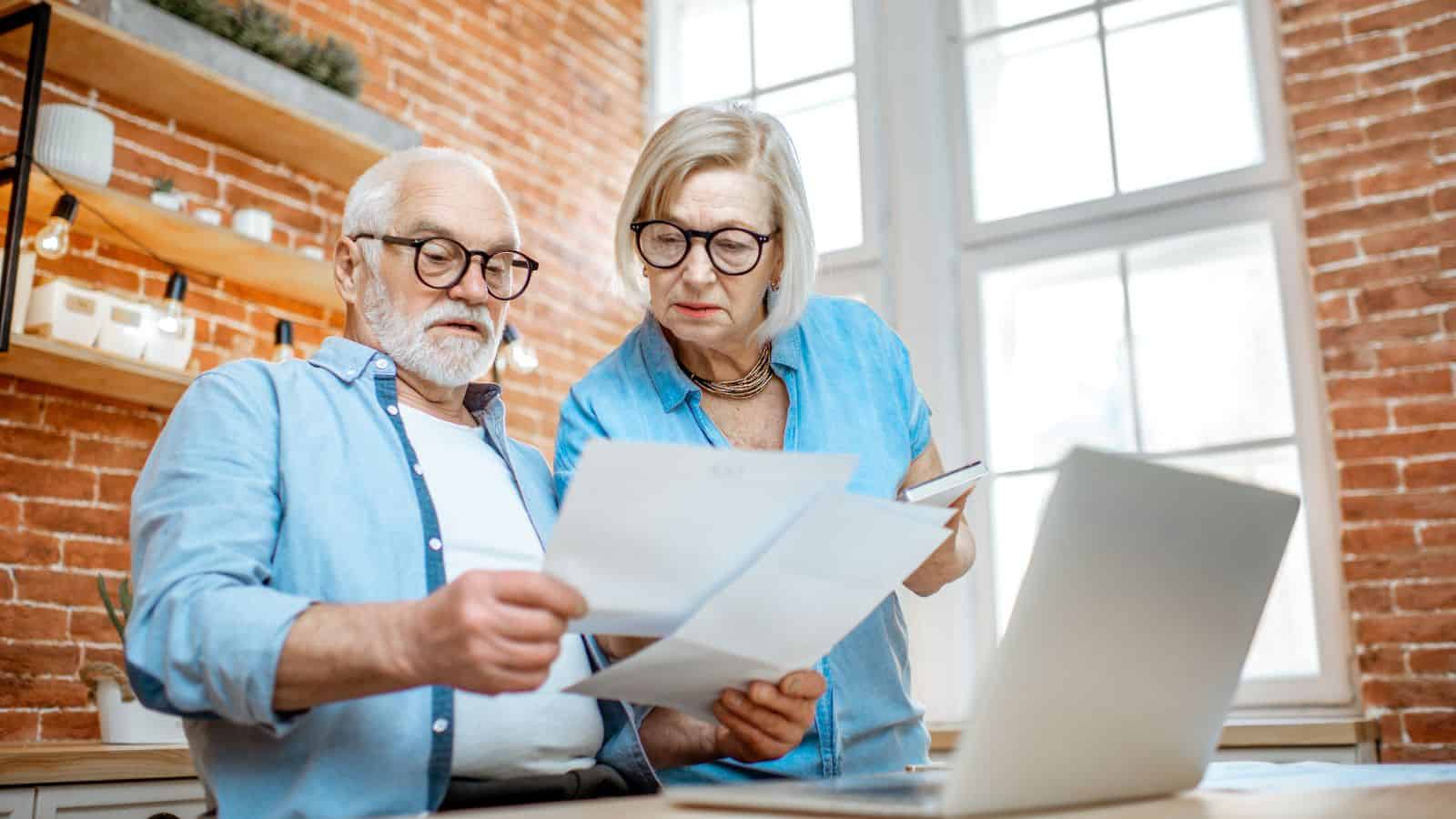 Elderly Couple Paying Bills