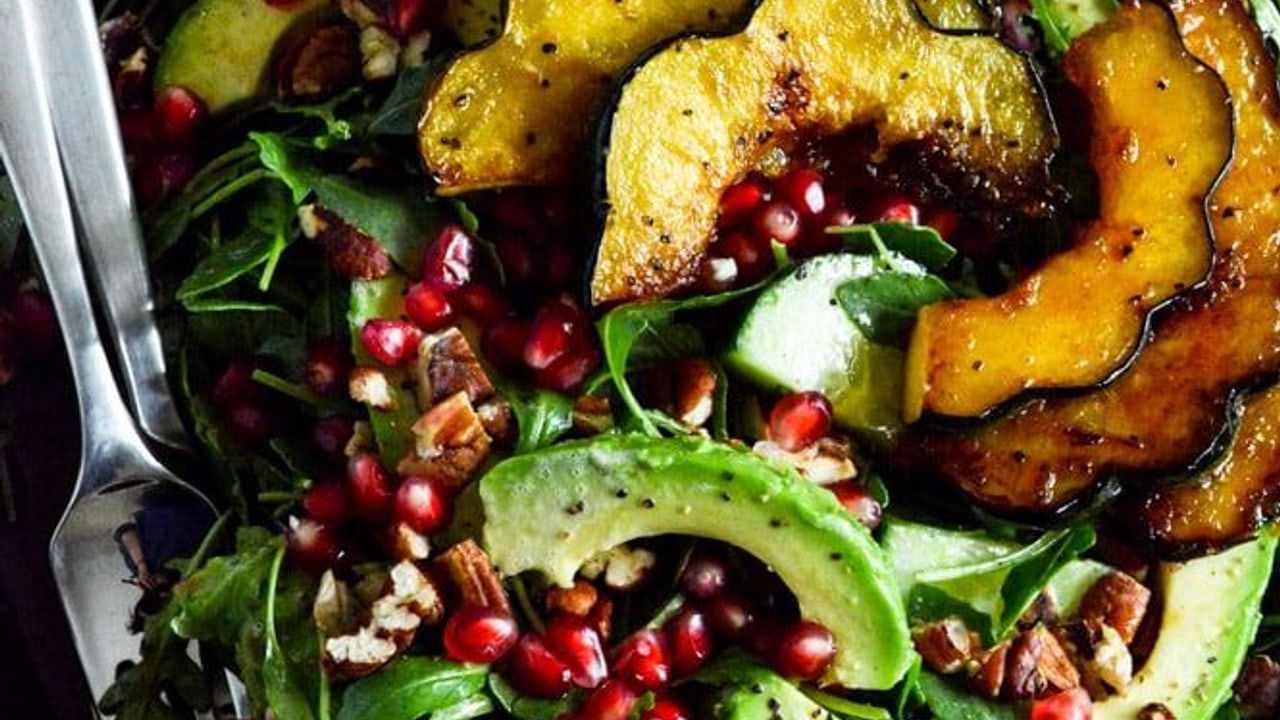 Autumn Arugula Salad with Caramelized Squash, Spiced Pecans and Pomegranate Ginger Vinaigrette
